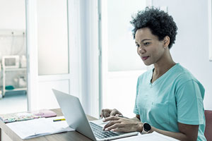 Advanced practitioner reading a PracticeMatch career article