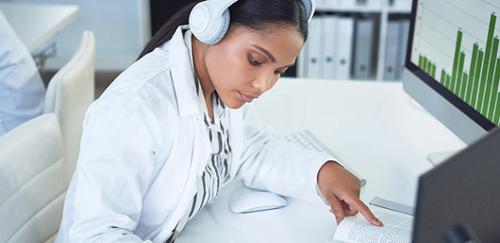 physician listening to a podcast